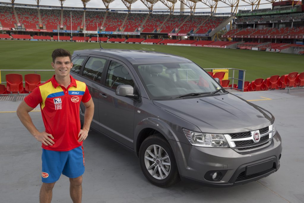 Gold Coast Suns midfielder Jaeger O’Meara with his Fiat Freemont. Gold Coast Suns midfielder Jaeger O’Meara with his Fiat Freemont.